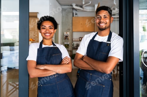 Preview: Barista and waiter working in a bar cafeteria shop
