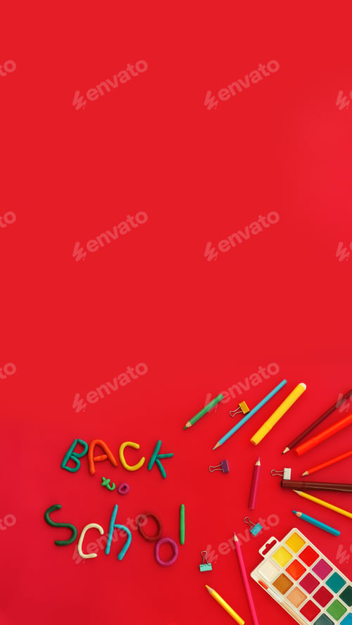 banner words colored plasticine back to school felt-tip pens paints pen paper clips red background