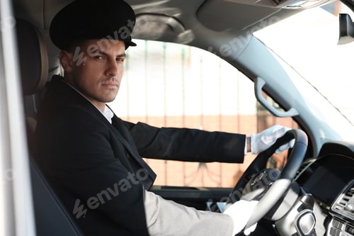 Preview: Professional driver in luxury car. Chauffeur service