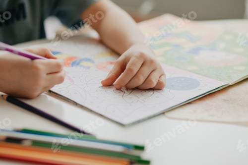 Preview: 5 years old boy preschool draws with a pencil