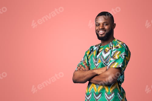 Preview: Confident black man smiling on blue studio background