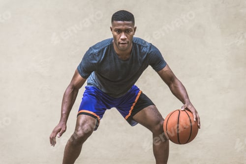 Preview: Basketball player training outdoors