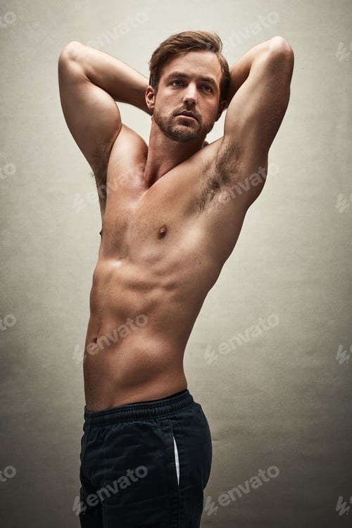 Preview: Shot of a handsome and muscular young man posing shirtless in the studio