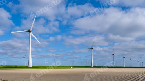 Preview: Windmill turbines at sea a huge winmill park in the Netherlands during winter