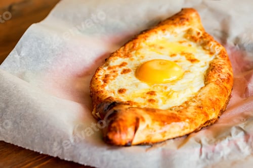 Preview: Ajarian khachapuri Georgian cheese pie with egg close