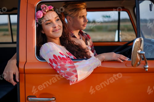 Preview: Hippie couple in a van on a road trip