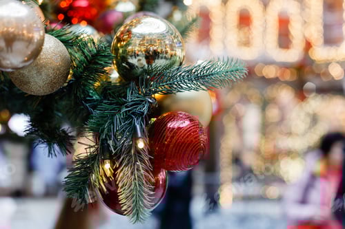 Preview: Close up of balls on christmas tree. Bokeh garlands in the background. New Year concept.