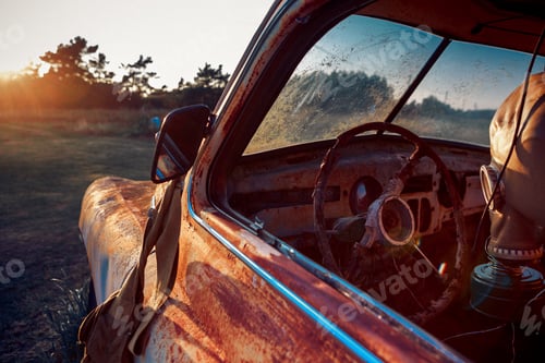 Preview: Old rusty abandoned car with a respirator mask