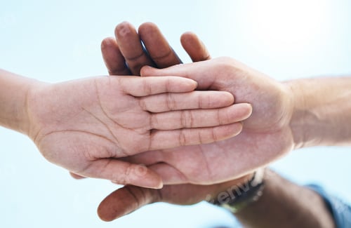 Preview: Teamwork, motivation and diversity with people hands stacked with blue sky, lens flare background a
