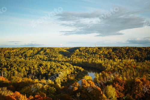 Preview: Autumn forest on river bank. Forest river in autumn. Autumn forest river. Autumn forest landscape