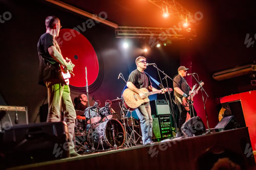 Preview: Band performs on stage in a nightclub