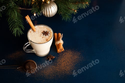 Preview: homemade traditional Christmas drink eggnog with spices and cinnamon. Winter holidays.