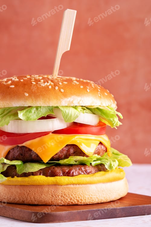 Preview: Styled double burger with cheese, beef, green lettuce and onions