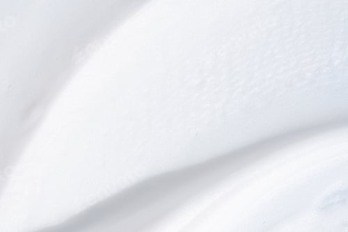 Preview: Smooth smudge of white shaving foam.