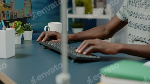 Preview: Close up of photography artist doing editing work on photos