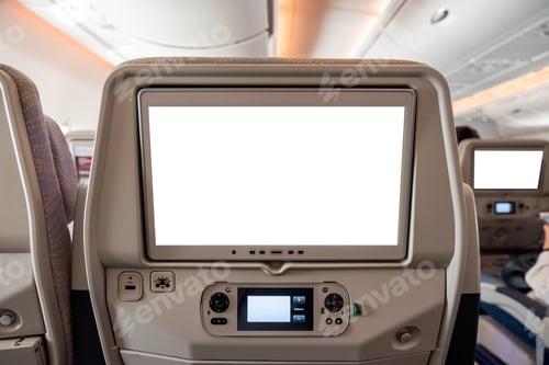 Preview: White display screen with joystick on rear seat in airplane