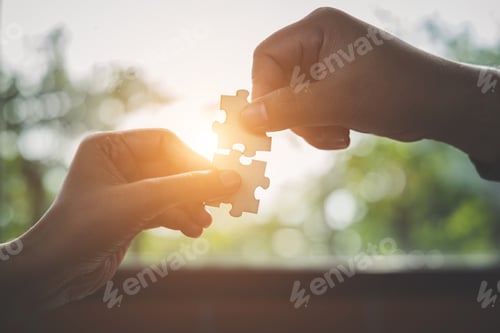 Preview: Business solutions, Businesswoman hand connecting jigsaw with businessman hand
