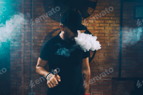Preview: Man vaping an electronic cigarette
