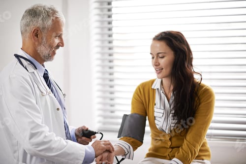 Preview: Your blood pressure is reading normal. Cropped shot of a doctor checking a patients blood pressure.