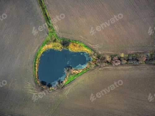 Preview: Lake on on field - drone shot