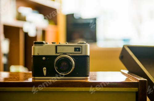 Preview: Vintage rangefinder camera on table
