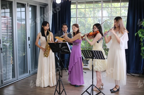 Preview: classic musical song student are learning to play a music instrument in sound studio musician class