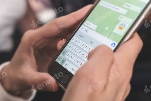 Preview: Woman hands using smartphone