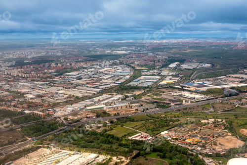 Preview: Aerial view of a town and lands.