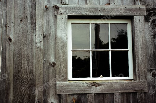 Preview: Closeup shot of an old window of a wooden house