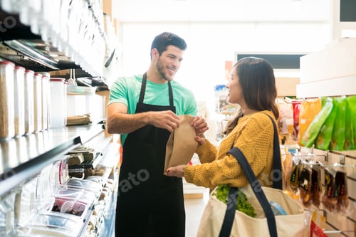 Preview: Mid Adult Woman Shopping In Grocery Store