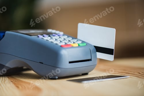 Preview: close-up shot of edc machine with card in slider