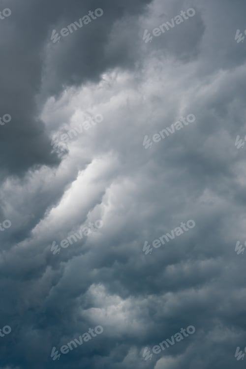 Preview: dramatic cloudy dark clouds before a storm. deep blue and grey heavy clouds. weather forecast