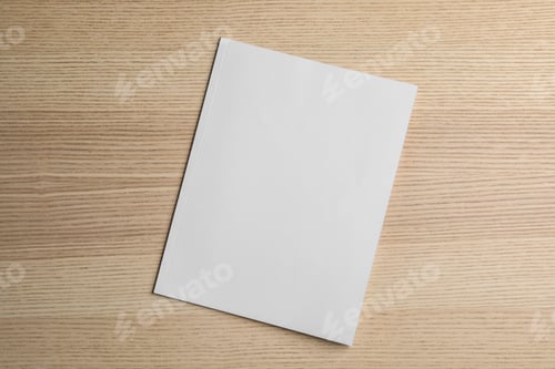 Preview: Brochure with blank cover on wooden background, top view. Mock up for design