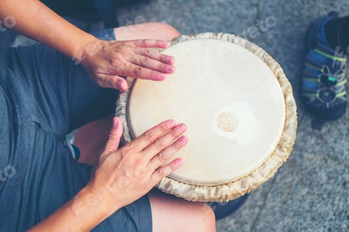 Preview: People hands playing music at djembe drums, vintage filter image