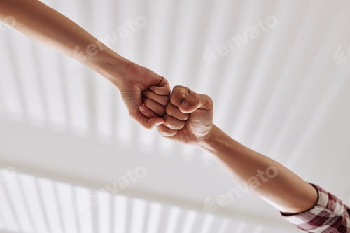 Preview: People making fist bump