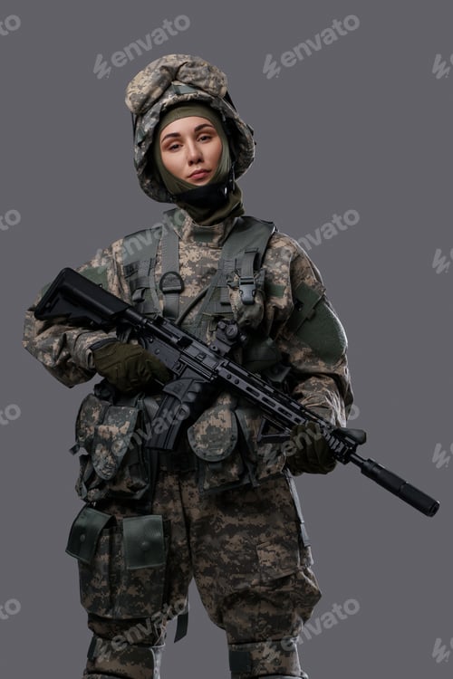 Preview: Brave woman soldier dressed in camouflage clothes with rifle