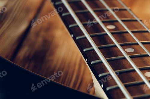 Preview: Close up photo of electric guitar fingerboard