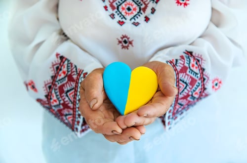 Preview: Grandmother is a Ukrainian patriot in an embroidered shirt. selective focus.