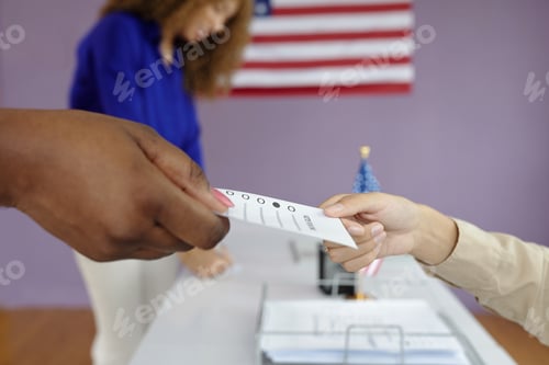 Preview: Woman Taking Bulletin To Vote