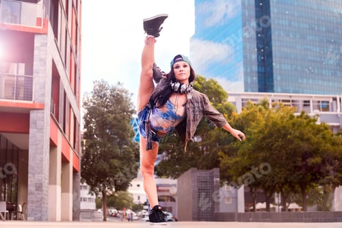 Preview: Dancer kicking and balancing on one leg, Cape Town, South Africa