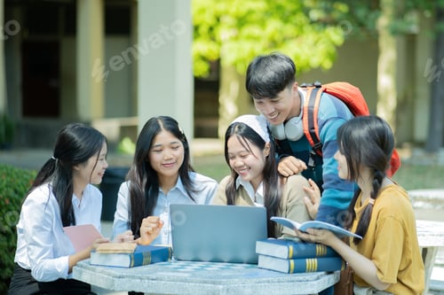 Preview: Group of students studying on campus outdoors