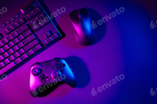 Preview: Computer keyboard, mouse and joystick on black background