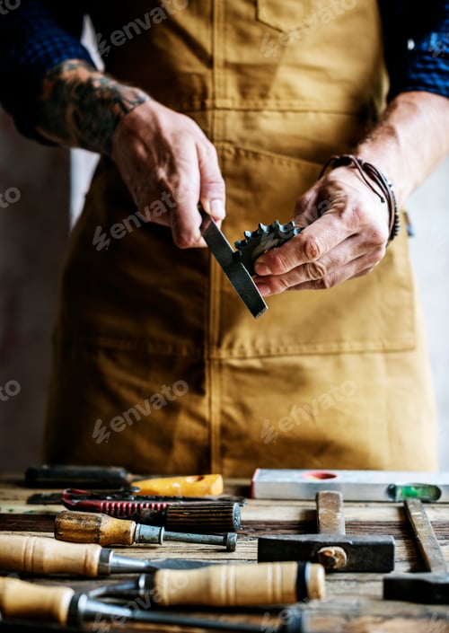 Preview: Closeup of carpenter man working with tools equipment set