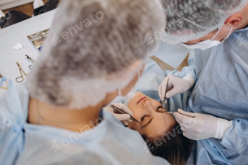 Preview: In the Hospital Operating Room Diverse Team of Professional Surgeons and Nurses Suture Wound