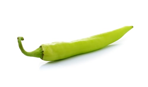 Preview: green chilli pepper on white background.