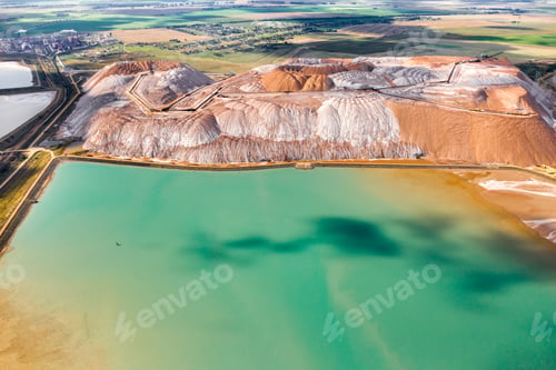 Preview: Mountains of products for the production of potash salt and artificial turquoise reservoirs.Salt