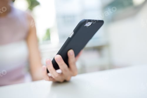 Preview: Woman use of mobile phone