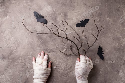 Preview: Halloween background with mummys hand