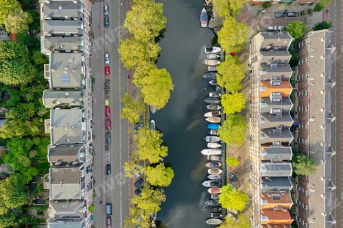 Preview: Aerial shot of canal in Amsterdam centre, lines are vertical