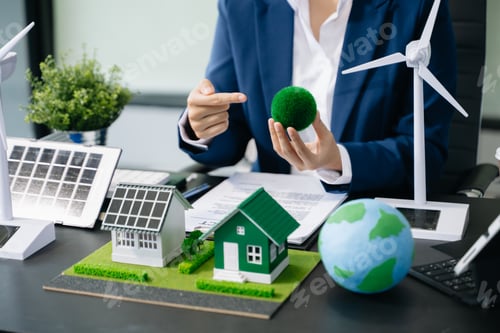 Preview: Business planning hand using laptop for working technology and business Net zero and carbon neutral